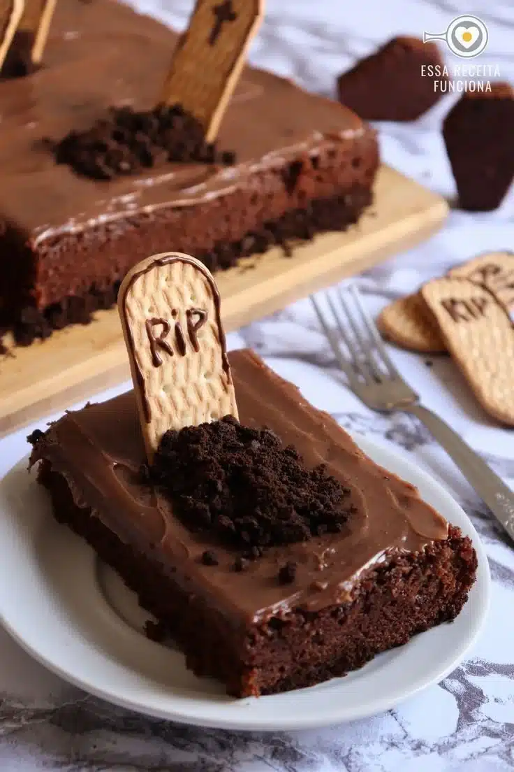 Halloween-themed chocolate cake with spooky decorations and frosting.